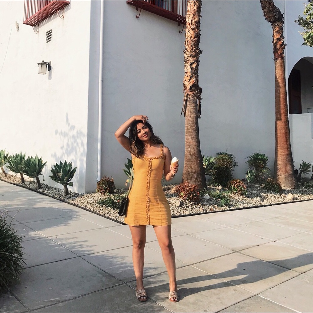 Mustard yellow mini dress with buttons